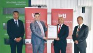 Officials receiving the ISO 9001:2015 certificate.