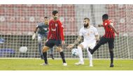 Al Rayyan and Umm Salal players in action during yesterday's match.