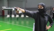 Nasra Muhammad in action during yesterday's  10-metre air pistol event of the Amir Cup Shooting Championships at the Lusail Shooting Range.
