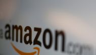 FILE PHOTO: The logo of Amazon.com is pictured in this June 8, 2017 illustration photo. REUTERS/Carlos Jasso/Illustration