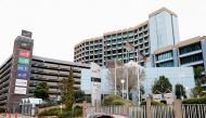 FILE PHOTO: A car drives past a building of one of the state-owned companies, the South African Broadcasting Corporation (SABC), amid a nationwide coronavirus disease (COVID-19) lockdown in Auckland Park, in Johannesburg, South Africa, September 1, 2020. 