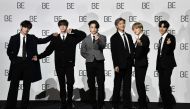South Korean K-pop boy band BTS members (L to R) V, Jin, Jung Kook, RM, Jimin and J-Hope pose for a photo session during a press conference on BTS new album 'BE (Deluxe Edition)' in Seoul on November 20, 2020. / AFP / Jung Yeon-je