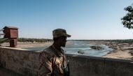 A member of the Amhara Special Forces watches on at the border crossing with Eritrea, in Humera, Ethiopia, on November 22, 2020. AFP / EDUARDO SOTERAS