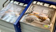 The 2021 catalogues are stacked at an IKEA store on the outskirts of Stockholm, Sweden December 5, 2020. Picture taken December 5, 2020. REUTERS/Anna Ringstrom