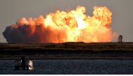 SpaceX's first super heavy-lift Starship SN8 rocket explodes during a return-landing attempt after it launched from their facility on a test flight in Boca Chica, Texas U.S. December 9, 2020. REUTERS/Gene Blevins