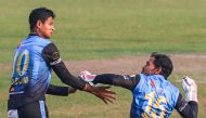 Beximco Dhaka captain Mushfiqur Rahim (R) gestures towards teammate Nasum Ahmed during a domestic cricket match of the Bangabandhu Twenty20 Cup in Dhaka on December 15, 2020. AFP / Zabed Hasnain Chowdhury 