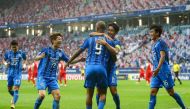 Ulsan's forward Junior Negrao (C) celebrates with his team after scoring during the AFC Champions League finals football match between Iran's Persepolis and Korea's Ulsan Hyundai on December 19, 2020 at the al-Janoub Stadium in the Qatari city of Al Wakra