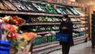 A woman shops at an Aldo store, amid the coronavirus disease (COVID-19) outbreak, Balham, London, Britain December 22, 2020. Reuters/Hannah McKay