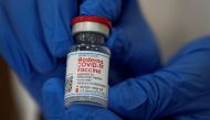 An employee shows the Moderna coronavirus disease (COVID-19) vaccine at Northwell Health's Long Island Jewish Valley Stream hospital in New York, U.S., December 21, 2020. Reuters/Eduardo Munoz/File Photo
