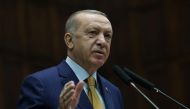 FILE PHOTO: Turkish President Tayyip Erdogan addresses members of his ruling AK Party during a meeting at the parliament in Ankara, Turkey, December 23, 2020. Presidential Press Office/Handout via REUTERS