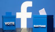 FILE PHOTO: 3D printed ballot boxes are seen in front of a displayed Facebook logo in this illustration taken November 4, 2020. REUTERS/Dado Ruvic/Illustration/File Photo
