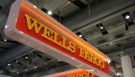 A Wells Fargo logo is seen at the SIBOS banking and financial conference in Toronto, Ontario, Canada October 19, 2017. Picture taken October 19, 2017. REUTERS/Chris Helgren/File Photo