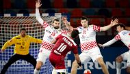 Qatar's Frankis Carol Marzo attempts to score against Croatia during their IHF Handball World Championship Preliminary Round Group C match on Tuesday. 