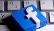 FILE PHOTO: A 3D-printed Facebook logo is seen placed on a keyboard in this illustration taken March 25, 2020. REUTERS/Dado Ruvic/Illustration/File Photo
