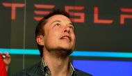 CEO of Tesla Motors Elon Musk reacts following the company's initial public offering at the NASDAQ market in New York June 29, 2010. REUTERS/Brendan McDermid/File Photo/File Photo