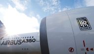 An Airbus A350 is pictured with a Rolls-Royce logo at the Airbus headquarters in Toulouse, France December 4, 2014. REUTERS/ Regis Duvignau/File Photo