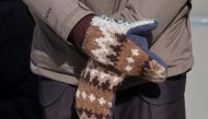 FILE PHOTO: Senator Bernie Sanders wears mittens as he attends the inauguration of Joe Biden as the 46th President of the United States on the West Front of the U.S. Capitol in Washington, U.S., January 20, 2021. REUTERS/Jonathan Ernst/Pool/File Photo
