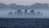 Stonehenge ancient stone circle is seen at dawn, near Amesbury, Wiltshire, Britain, November 4, 2020. REUTERS/Toby Melville/File Photo