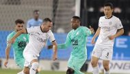 Al Sadd's Santi cazorla in action against Al Ahli players. 