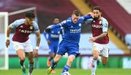 Soccer Football - Premier League - Aston Villa v Leicester City - Villa Park, Birmingham, Britain - February 21, 2021 Leicester City's Jamie Vardy in action with Aston Villa's Douglas Luiz and Tyrone Mings Pool via REUTERS/Michael Regan