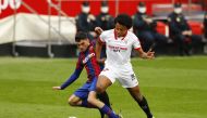 Barcelona's Pedri in action with Sevilla's Jules Kounde REUTERS/Marcelo Del Pozo
