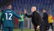 AC Milan's Ante Rebic celebrates scoring their second goal with coach Stefano Pioli REUTERS/Alberto Lingria