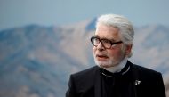 German designer Karl Lagerfeld appears at the end of his Spring/Summer 2019 women's ready-to-wear collection show for fashion house Chanel during Paris Fashion Week in Paris, France, October 2, 2018. REUTERS/Stephane Mahe/File Photo