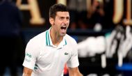 February 21, 2021 Serbia's Novak Djokovic celebrates winning his final match against Russia's Daniil Medvedev REUTERS/Asanka Brendon Ratnayake/File Photo