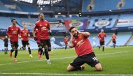 Soccer Football - Premier League - Manchester City v Manchester United - Etihad Stadium, Manchester, Britain - March 7, 2021 Manchester United's Bruno Fernandes celebrates scoring their first goal Pool via REUTERS/Laurence Griffiths