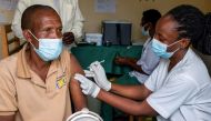 A man receives a vaccine against the coronavirus disease (COVID-19) at the Masaka hospital in Kigali, Rwanda March 5, 2021. REUTERS/Jean Bizimana/File Photo
