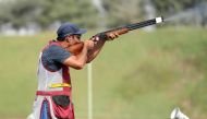 Nasser Saleh Al Attiyah in action during the Men's Skeet Shooting final at the ISSF World Cup in New Delhi, India, yesterday. 