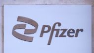 FILE PHOTO: Pfizer logo seen outside their building in Manhattan, New York City, New York, U.S., March 2, 2021. REUTERS/Carlo Allegri