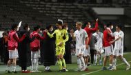Japan players celebrate at the end of the match REUTERS/Issei Kato