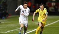 Italy's Federico Bernardeschi in action with Lithuania's Gratas Sirgedas REUTERS/Ints Kalnins