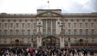 People gather outside Buckingham Palace after Britain's Prince Philip, husband of Queen Elizabeth, died at the age of 99, in London, Britain, April 9, 2021. REUTERS/Henry Nicholls
