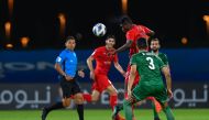 Al Duhail's Michael Olunga heads the ball during his team's second Group C match against Al Ahli Saudi FC in Jeddah, yesterday.
