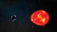 A black hole located approximately 1,500 light years from our solar system, discovered in the constellation Monoceros, pulls at a nearby red giant star, distorting its light in an undated illustration. Ohio State illustration/Lauren Fanfer/Handout via REU