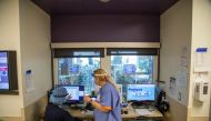 Nurses check the charts of two coronavirus disease (COVID-19) patients inside the intensive care unit of Humber River Hospital in Toronto, Ontario, Canada April 15, 2021. Picture taken on April 15, 2021. REUTERS/Carlos Osorio