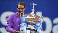 April 25, 2021 Spain's Rafael Nadal celebrates with the trophy after winning the Barcelona Open against Greece's Stefanos Tsitsipas REUTERS/Albert Gea