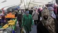 People wearing protective face masks shop at a fresh market, amid the coronavirus disease (COVID-19) pandemic, in Istanbul, Turkey April 26, 2021. REUTERS/Dilara Senkaya