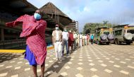 Kenyan tour guides and travel operators queue to receive the AstraZeneca/Oxford vaccine against the coronavirus disease (COVID-19), under the COVAX scheme, in Nairobi, Kenya, April 27, 2021. REUTERS/Monicah Mwangi