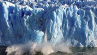 Splinters of ice peel off from one of the sides of the Perito Moreno glacier near the city of El Calafate in the Patagonian province of Santa Cruz, southern Argentina, July 7, 2008. REUTERS/Andres Forza/File Photo