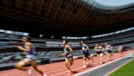Japan's Kazuto IIzawa (11) competes with others during the men's 1500mm final at the morning session of the Athletics test event. REUTERS/Issei Kato