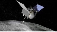 File photo: The Origins, Spectral Interpretation, Resource Identification, Security-Regolith Explorer (OSIRIS-REx) spacecraft which will travel to the near-Earth asteroid Bennu and bring a sample back to Earth for study is seen in an undated NASA artist r