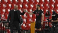  Real Madrid's Karim Benzema celebrates scoring their fourth goal with coach Zinedine Zidane REUTERS/Jon Nazca