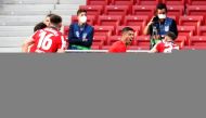 Atletico Madrid's Luis Suarez celebrates scoring their second goal with teammates as Osasuna players look dejected REUTERS/Juan Medina 