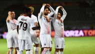 AC Milan's Theo Hernandez celebrates scoring their first goal with teammates REUTERS/Massimo Pinca
