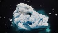 An iceberg floats in a fjord near the town of Tasiilaq, Greenland, June 24, 2018. REUTERS/Lucas Jackson/File Photo