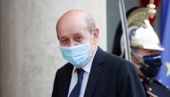 French European and Foreign Affairs Minister Jean-Yves Le Drian arrives for a dinner with French President Emmanuel Macron and leaders of African states and international organisations on the eve of a summit on aid for Africa, at Elysee Palace in Paris, F