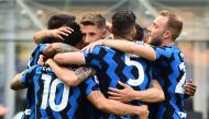Inter Milan's Lautaro Martinez celebrates scoring their third goal with teammates REUTERS/Massimo Pinca
